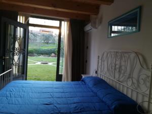 Postel nebo postele na pokoji v ubytování B&B Corte Preare