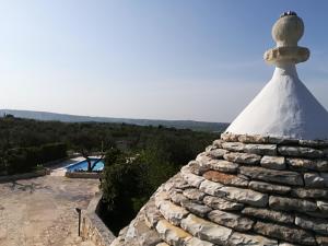 The swimming pool at or close to Trullo Monte Del Sale