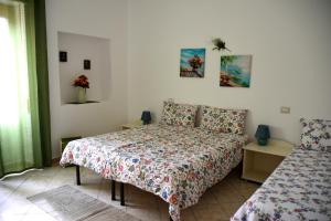 Postel nebo postele na pokoji v ubytování B&B in Centro