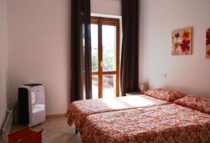 Voodi või voodid majutusasutuse B&B in Centro toas