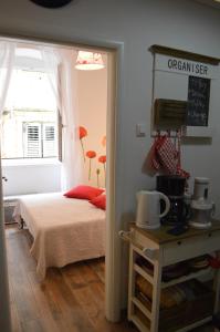 Postel nebo postele na pokoji v ubytování Apartment Charli