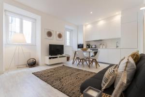 Kuchyň nebo kuchyňský kout v ubytování FLH Graça Cozy Flat