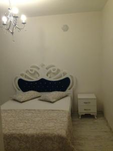 A bed or beds in a room at Zübeyde Hanım Homes
