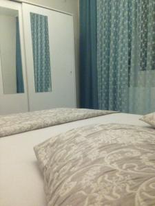 A bed or beds in a room at Zübeyde Hanım Homes
