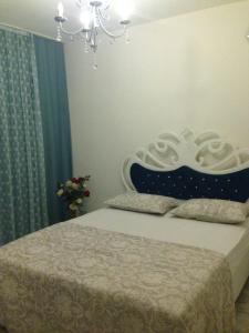 A bed or beds in a room at Zübeyde Hanım Homes