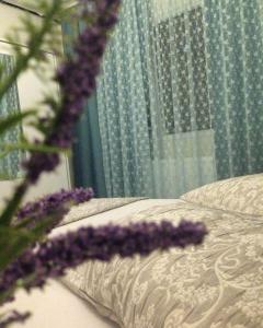 A bed or beds in a room at Zübeyde Hanım Homes