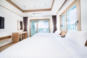 Postel nebo postele na pokoji v ubytování Hotel Run