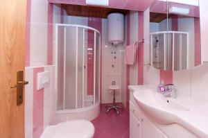 Kúpeľňa v ubytovaní Apartments Maravera + 37 fotografií
