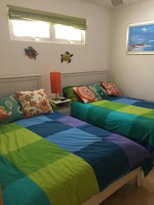 Postel nebo postele na pokoji v ubytování Marbella Apartment Juan Dolio