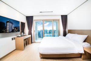 Postel nebo postele na pokoji v ubytování Hotel Run
