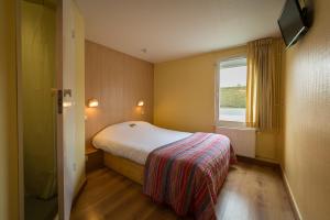 Katil atau katil-katil dalam bilik di Fasthotel Annecy