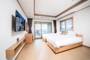 Postel nebo postele na pokoji v ubytování Hotel Run