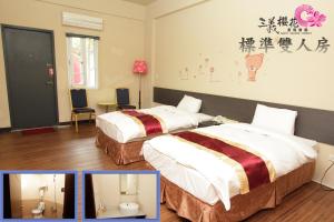 Tempat tidur dalam kamar di Sanyi Sakura Resort