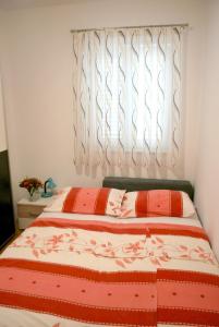 Postel nebo postele na pokoji v ubytování Apartment Dalmatia