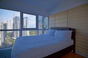 Postel nebo postele na pokoji v ubytování Victoria SOHO Suites + 33 fotografií