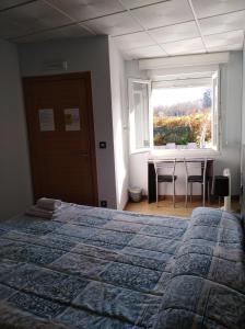 Кровать или кровати в номере O Cruceiro