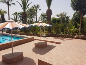 Bazén v ubytování Residence Yasmina Agadir nebo v jeho okolí