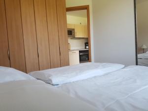 Postel nebo postele na pokoji v ubytování Schwalbennest
