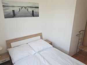 Postel nebo postele na pokoji v ubytování Schwalbennest
