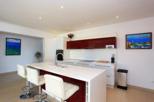 Kuchyň nebo kuchyňský kout v ubytování Villa Summer Dreams Apartments