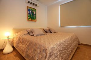 Postel nebo postele na pokoji v ubytování Villa Summer Dreams Apartments