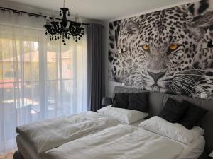 Łóżko lub łóżka w pokoju w obiekcie Enjoyit Rooms