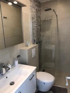 Łazienka w obiekcie Enjoyit Rooms