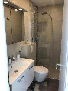Łazienka w obiekcie Enjoyit Rooms