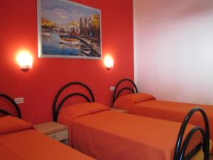 Posteľ alebo postele v izbe v ubytovaní Palinuro casa vacanze "Donna Antonia"