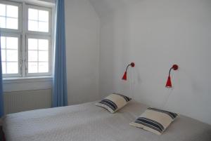 Katil atau katil-katil dalam bilik di Halmstad Hotell & Vandrarhem Kaptenshamn