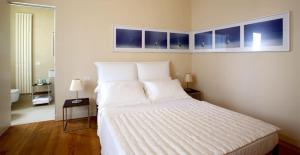 Cama ou camas em um quarto em Villa Rosmarino