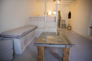 Postel nebo postele na pokoji v ubytování Pyrgos Stone House