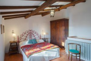 En eller flere senge i et værelse på Santa Lucia Suite Camaiore