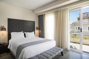 Posteľ alebo postele v izbe v ubytovaní Hotel Lozenge + 37 fotografií