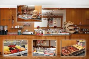 a buffet with many different types of food on display at Schlossgasthaus Lichtenwalde in Lichtenwalde