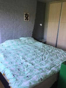 Кровать или кровати в номере Au 194