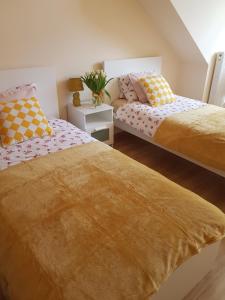 Posteľ alebo postele v izbe v ubytovaní Apartment Karpacz