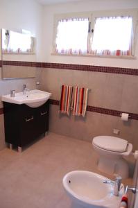 Ванна кімната в Bed & Breakfast La Volpe e L'Uva