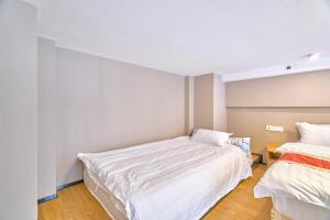 Postel nebo postele na pokoji v ubytování Plesant Daily Rental Apartment