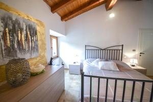 a bedroom with a bed in a room at Family Retreat in Riva del Garda