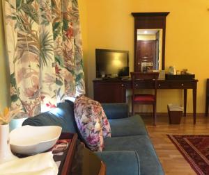 TV a/nebo společenská místnost v ubytování Massabki Hotel