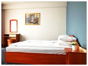 מיטה או מיטות בחדר ב-Hotel Rahovets