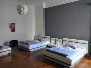 Postel nebo postele na pokoji v ubytování Apartments Týnská 7