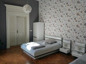 Postel nebo postele na pokoji v ubytování Apartments Týnská 7