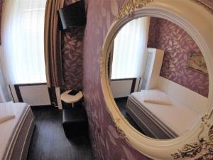 Postel nebo postele na pokoji v ubytování Hotel Goldene Spinne