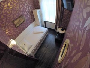 Postel nebo postele na pokoji v ubytování Hotel Goldene Spinne