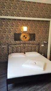 Postel nebo postele na pokoji v ubytování Hotel Goldene Spinne