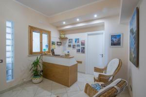 TV a/nebo společenská místnost v ubytování B&B Il Nespolo