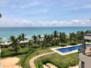 an aerial view of the ocean from aominium at Araliya OceanFront Condos Nilaveli, Trincomalee in Nilaveli