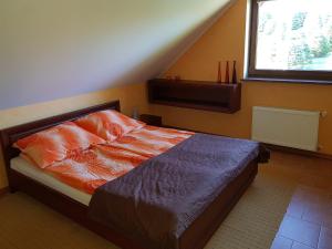Posteľ alebo postele v izbe v ubytovaní RAJSKA PRZYSTAŃ
